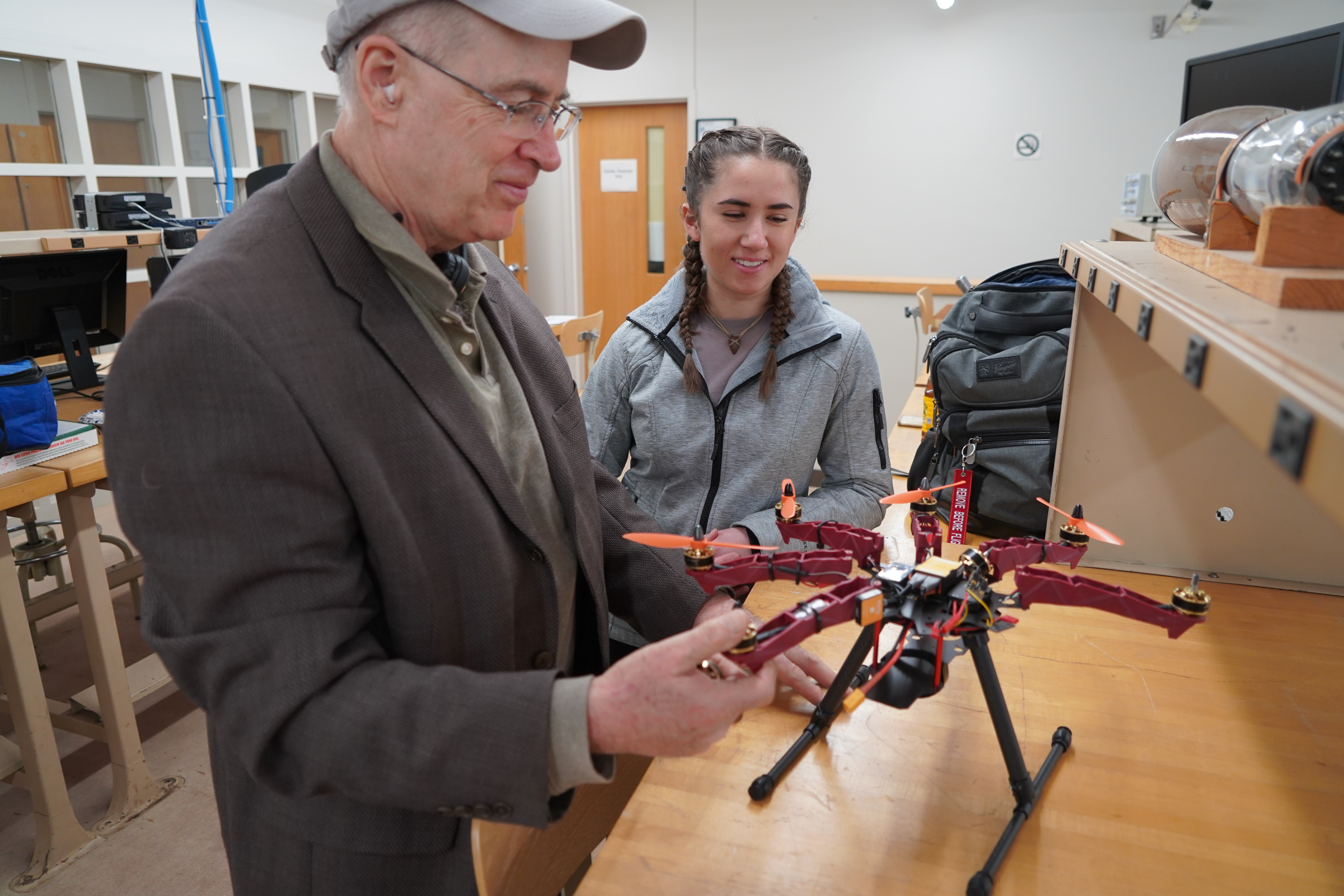 Student and professor with drone 